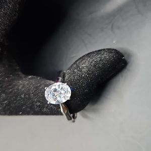 G-2 Silvertone clear solitaire ring